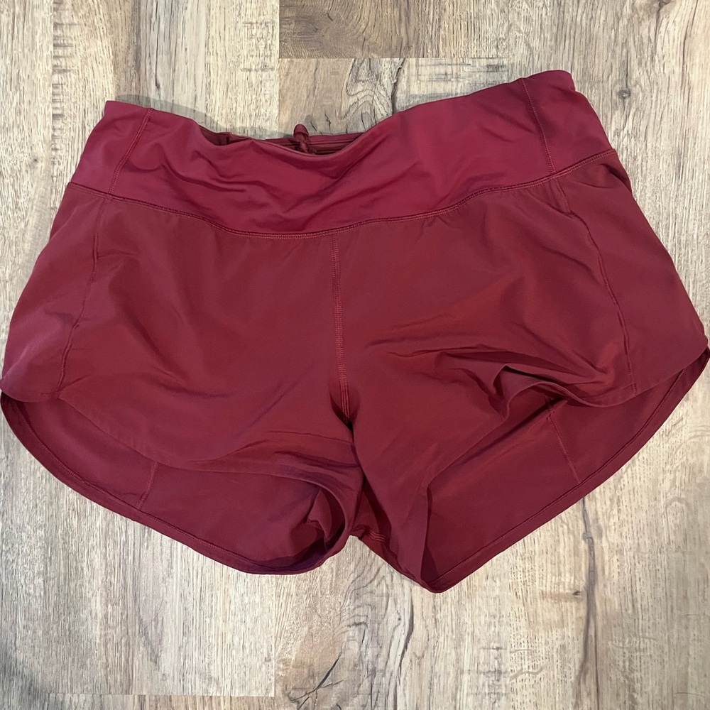Lululemon shorts. Red. **unsure of size but likely size 8**